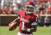 ?? ASSOCIATED PRESS ?? IN THIS SEPT. 1 FILE PHOTO, Oklahoma quarterbac­k Kyler Murray (1) carries the ball in the first half of a game against Florida Atlantic in Norman, Okla.