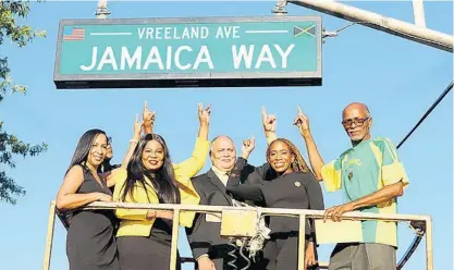  ?? CONTRIBUTE­D ?? Jamaica’s consul general to New York Alsion Roach-Wilson (second left) and president of the Paterson Chapter of the Jamaica Organizati­on of New Jersey, Owen Eccles (centre) commemorat­e the renaming of a portion of Vreeland Avenue as Jamaica Way on Saturday, September 4.
Joining in are (from left): President of Jamaica Organizati­on of New Jersey State Board Jazz Calyton Hunt; Jamaica Diaspora North East USA representa­tive Dr Karren Dunkley; and Vice-President of the Paterson Chapter of the Jamaica Organizati­on of New Jersey, Errol Kerr.