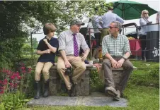  ??  ?? Taking a break: William Foreman, Ivan Reid and Peter Lewis