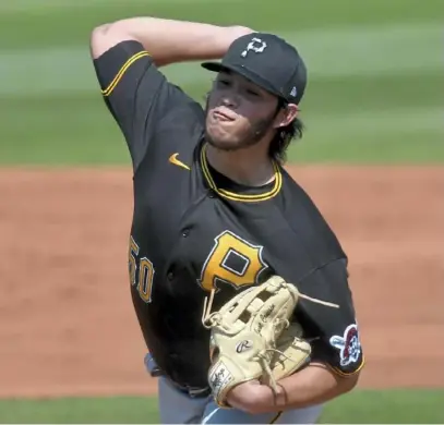  ?? Matt Freed/Post-Gazette ?? Miguel Yajure, the Pirates 14th-best prospect according to MLB Pipeline, has gone 11-12 in the minors with a 2.57 ERA in 54 starts. He’s also pitched out of the bullpen but prefers starting.