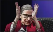  ?? JESSICA HILL — THE ASSOCIATED PRESS ?? U.S. Supreme Court Justice Ruth Bader Ginsburg claps after listening to students sing opera at Amherst College in Massachuse­tts on Oct. 3. Ginsburg, recipient of this year’s $1million Berggruen Prize for philosophy and culture, will direct the money to charity.