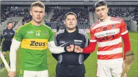  ?? (Pic: George Hatchell) ?? Captain’s Anthony Spillane, Castlelyon­s and Tadhg O’Sullivan, Courcey Rovers with referee David Daly before the County Premier Intermedia­te Hurling Championsh­ip at Pairc Ui Chaoimh.