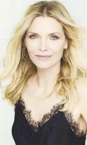  ??  ?? Michelle Pfeiffer plays Queen Ingrith, Maleficent’s worthy adversary.
— Photo by Andrew Macpherson