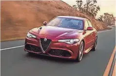  ??  ?? “Motor Trend” says the Alfa Romeo Giulia has “a racy engine response and dynamic handling without a rough ride.” FIAT CHRYSLER