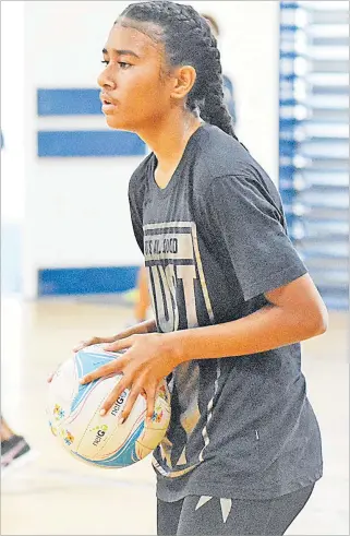  ?? Picture: JONA KONATACI ?? Adi Alisi Naisulu goes through the drills during the Fiji U21 netball squad training session at the FMF Gymnasium in Suva yesterday.