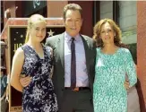  ??  ?? Cranston with his wife, Robin Dearden, and daughter Taylor on the Hollywood Walk of Fame in 2013