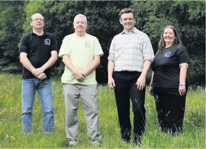  ?? WALES NEWS SERVICE ?? Actor Michael Sheen pictured with members of the Rhondda Tunnel Society in 2015