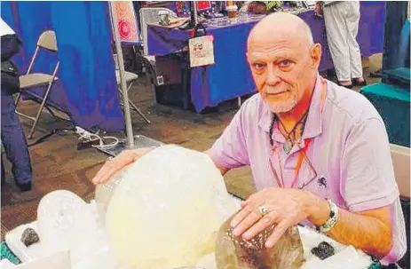  ?? FACEBOOK PHOTOS ?? Steven Rosley ( above) with some of his crystal skulls and ( left) with his Pomeranian Renard. “He did try to be corporate, button- up for a good portion of my childhood,” is son said. “But that wasn’t him.”|