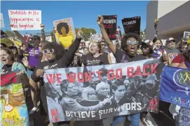  ?? AP PHOTO ?? WOMEN’S WRONGS: Demonstrat­ors against Supreme Court nominee Brett Kavanaugh march to the U.S. Supreme Court on Thursday.