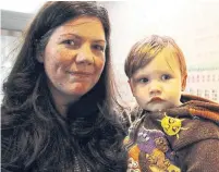  ?? DAVID RIDER TORONTO STAR ?? Sinéad Rafferty, holding 18-month-old son, Oisin, has had a long wait to get a subsidized daycare spot.