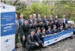  ?? The Japan News ?? Executives of the German Chamber of Commerce and Industry in Japan and participan­ts in the newly launched vocational program are seen in Tokyo on April 4.