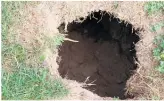  ?? ?? The mysterious hole at his home has Laurence Tanga baffled.