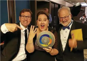  ?? Photo: Contribute­d ?? BIG WIN: Celebratin­g the Carnival of Flowers’ fourth win at the Queensland Tourism Awards are (from left) Cr Geoff McDonald, Kate Scott and Ross Begent.