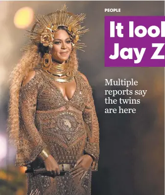  ?? MATT SAYLES, INVISION/ AP ?? Beyoncé was clearly pregnant when she performed at the Grammy Awards on Feb. 12. She’d announced the news of the twins justmore than a week earlier, with an Instagram post Feb. 1.