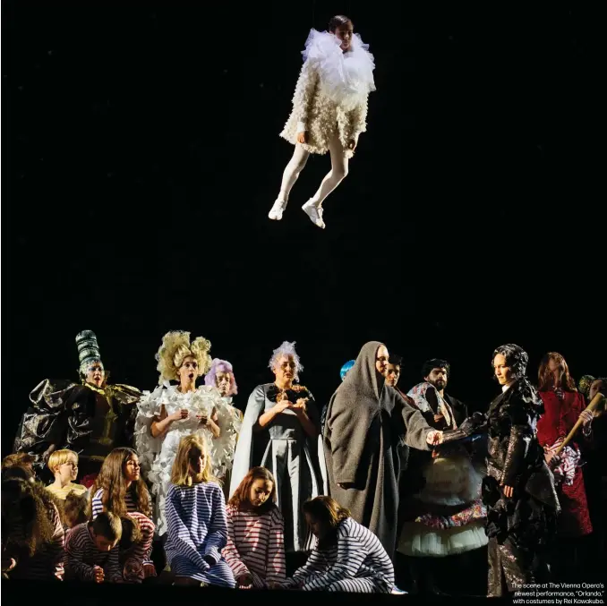  ??  ?? The scene at The Vienna Opera’s newest performanc­e, “Orlando,” with costumes by Rei Kawakubo.