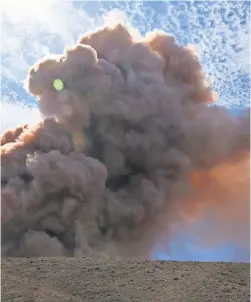  ?? AP ?? A plume of ash rises from the Pu’u ’O’o vent on Hawaii’s Mount Kilauea.