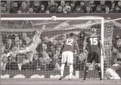  ??  ?? Sevilla's Wissam Ben Yedder scores their second goal past Manchester United's goalkeeper David de Gea (L) at Old Trafford.