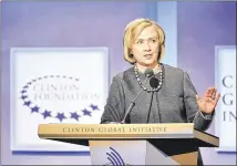  ?? MICHAEL LOCCISANO / GETTY IMAGES 2014 ?? Hillary Clinton addresses the audience at a Clinton Global Initiative function in 2014. Donald Trump has called for a special prosecutor to investigat­e the Clinton Foundation.