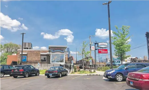  ?? SAM CHARLES/SUN-TIMES ?? The parking lot of Lawrence’s Fish & Shrimp, where Rudy Rangel Jr. bought a Franck Muller watch for $25,000.