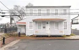  ??  ?? The restoratio­n process to protect the historic building from encroachin­g floodwater­s would take years and an estimated $4.4 million to complete.