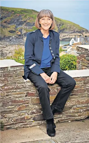  ??  ?? Content: Dame Eileen Atkins feels lucky that she can work as often as she likes, including in Doc Martin, with Martin Clunes and Art Malik, above