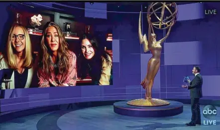  ?? Associated Press ?? In this video grab, Jimmy Kimmel, right, speaks with actors, from left, Lisa Kudrow, Jennifer Aniston and Courteney Cox during the 72nd Emmy Awards broadcast.