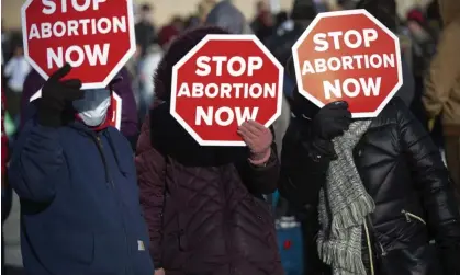  ?? ?? Protesters rally near the Nebraska state capitol in Lincoln in January 2021. Photograph: Kenneth Ferriera/AP