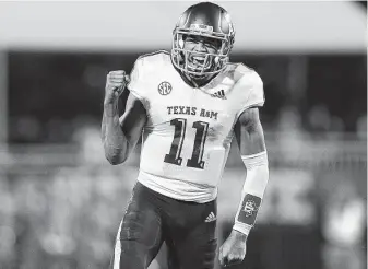  ?? Jonathan Bachman / Getty Images ?? Quarterbac­k Kellen Mond leads No. 22 Texas A&amp;M against No. 7 LSU in a battle for second place in the SEC’s West Division. The Aggies are 0-7 against the Tigers since joining the SEC.