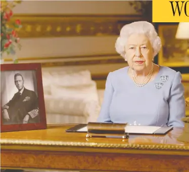  ?? BUCKINGHAM PALACE VIA GETTY IMAGES ?? Queen Elizabeth addresses the nation on the 75th anniversar­y of VE-DAY at Windsor Castle on Friday at 9 p.m., the exact time her father, King George VI, shown in a photo next to Her Majesty, addressed the country in 1945.