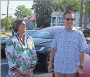  ?? Kevin Myrick ?? Darcy and Jamie Morris talk about how they believe tourism will come of new electric car chargers in the parking lot of the Cedartown Museum of Coca-Cola Memorabili­a. /