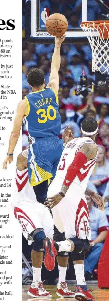  ?? EPA ?? Golden State Warriors guard Stephen Curry goes to the basket as Houston Rockets forward Josh Smith (right) and James Harden look on in Game 3 of their NBA Western Conference finals at the Toyota Center in Houston, Texas.