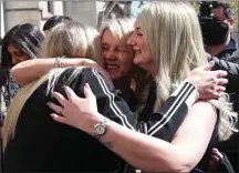  ??  ?? Former post office worker Janet Skinner (centre) celebrates with her niece Hayley Adams (right) and her daughter Toni Sisson after her conviction caused by the failed Horizon IT system was overturned by the Court of Appeal last week