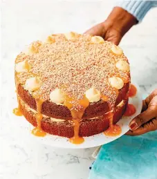  ??  ?? Mango and coconut yoghurt cake with German buttercrea­m from Nadiya Bakes by Nadiya Hussain