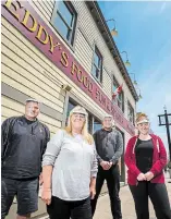  ?? JULIE JOCSAK TORSTAR ?? The Grimsby DIA has provided personal protective equipment to small business owners such as Teddy Jaskula, left, Sandy Jaskula, Michael Rilstone and Ali Rilstone to assist them with reopening their businesses.