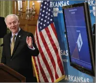  ?? (Arkansas Democrat-Gazette/John Sykes Jr.) ?? Gov. Asa Hutchinson discusses the imminent reopening of state parks and retail businesses during his daily briefing, held Friday at the governor’s conference room at the Capitol in Little Rock.