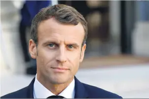  ?? Philippe Lopez/AFP ?? Com o objetivo de reverter a queda de popularida­de, Macron anunciou investimen­tos vultosos no combate à pobreza e no sistema público de saúde