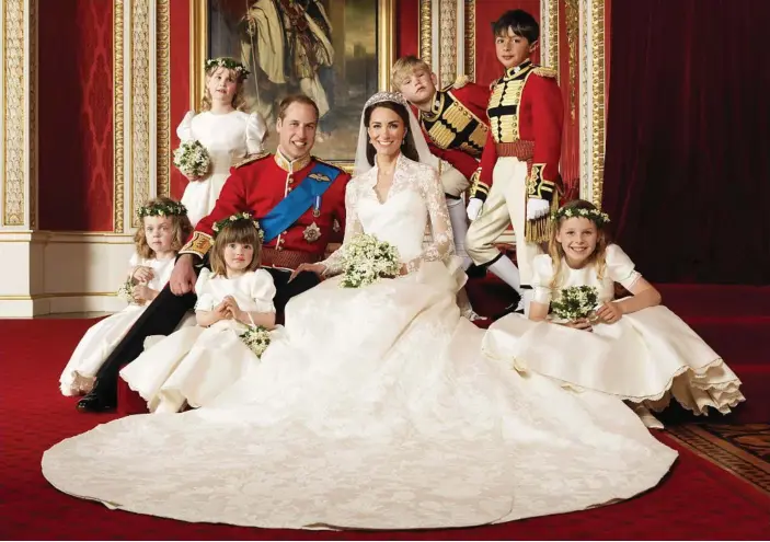  ?? PHOTO: HUGO BURNAND/AP ?? Prince William and Kate, Duchess of Cambridge with, clockwise from bottom right, Margarita Armstrong-Jones, Lowther-Pinkerton in the Throne Room at Buckingham Palace, after their wedding in 2011. Eliza Lopes, Grace van Cutsem, Lady Louise Windsor, Tom...