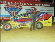  ?? RICH KEPNER - FOR DIGITAL FIRST MEDIA ?? Duane Howard celebrates in victory lane after winning the 2018 Big Diamond modified point championsh­ip at Big Diamond on Aug. 24.