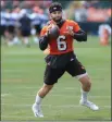  ?? TIM PHILLIS — FOR THE NEWS-HERALD ?? Browns quarterbac­k Baker Mayfield looks to pass on July 26 during a training camp practice in Berea.