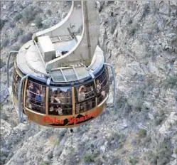  ?? Christophe­r Reynolds Los Angeles Times ?? THE PALM SPRINGS AERIAL Tramway climbs to a mountain station about 8,500 feet above the desert f loor.