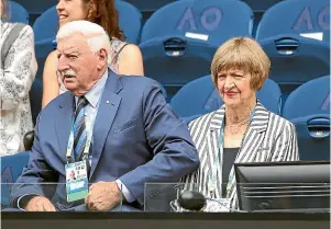  ?? GETTY IMAGES ?? Margaret Court and her husband Barrymore watch a women’s singles match at the Australian Open in Melbourne.