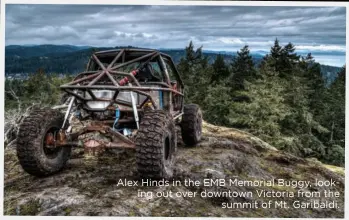  ??  ?? Alex Hinds in the EMB Memorial Buggy, looking out over downtown Victoria from the summit of Mt. Garibaldi.