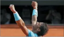  ?? MICHEL EULER — THE ASSOCIATED PRESS ?? Spain’s Rafael Nadal celebrates winning his semifinal match of the French Open tennis tournament against Argentina’s Juan Martin del Potro in three sets 6-4, 6-1, 6-2, at the Roland Garros stadium in Paris, France, Friday.