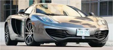  ?? NICK TRAGIANIS/Postmedia News photos ?? The 2014 McLaren MP4-12C Spider offers a civilized drive on ordinary roads.