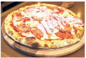  ??  ?? The pizza 3 salumi is a true delight that will find instant fans in pizza devotees.