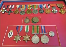  ??  ?? The collection of medals awarded to the ‘Hero of Buzancy’.