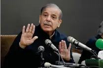  ?? AFP FILE PHOTO ?? BACK TO POWER?
Pakistan’s former prime minister and Pakistan Muslim League-Nawaz party leader Shehbaz Sharif speaks during a news conference in the eastern city of Lahore on Feb. 13, 2024.