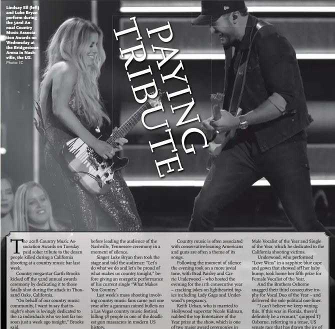  ?? Photo: IC ?? Lindsay Ell (left) and Luke Bryan perform during the 52nd Annual Country Music Associatio­n Awards on Wednesday at the Bridgeston­e Arena in Nashville, the US.