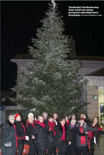  ?? PHOTOS BY BARBARA FLYNN ?? The Beating Time Barbershop Choir at the train station during the Ladies Night Out in Greystones.