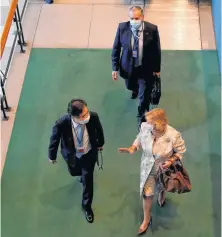  ?? REUTERS ?? Diplomats arrive through the delegates entrance at the 75th annual UN General Assembly at UN headquarte­rs, which is being held mostly virtually due to the coronaviru­s disease outbreak in New York on Sept. 22.